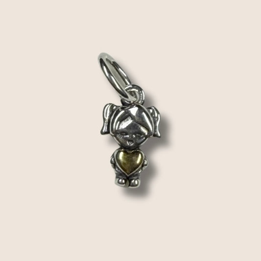 Niña charm