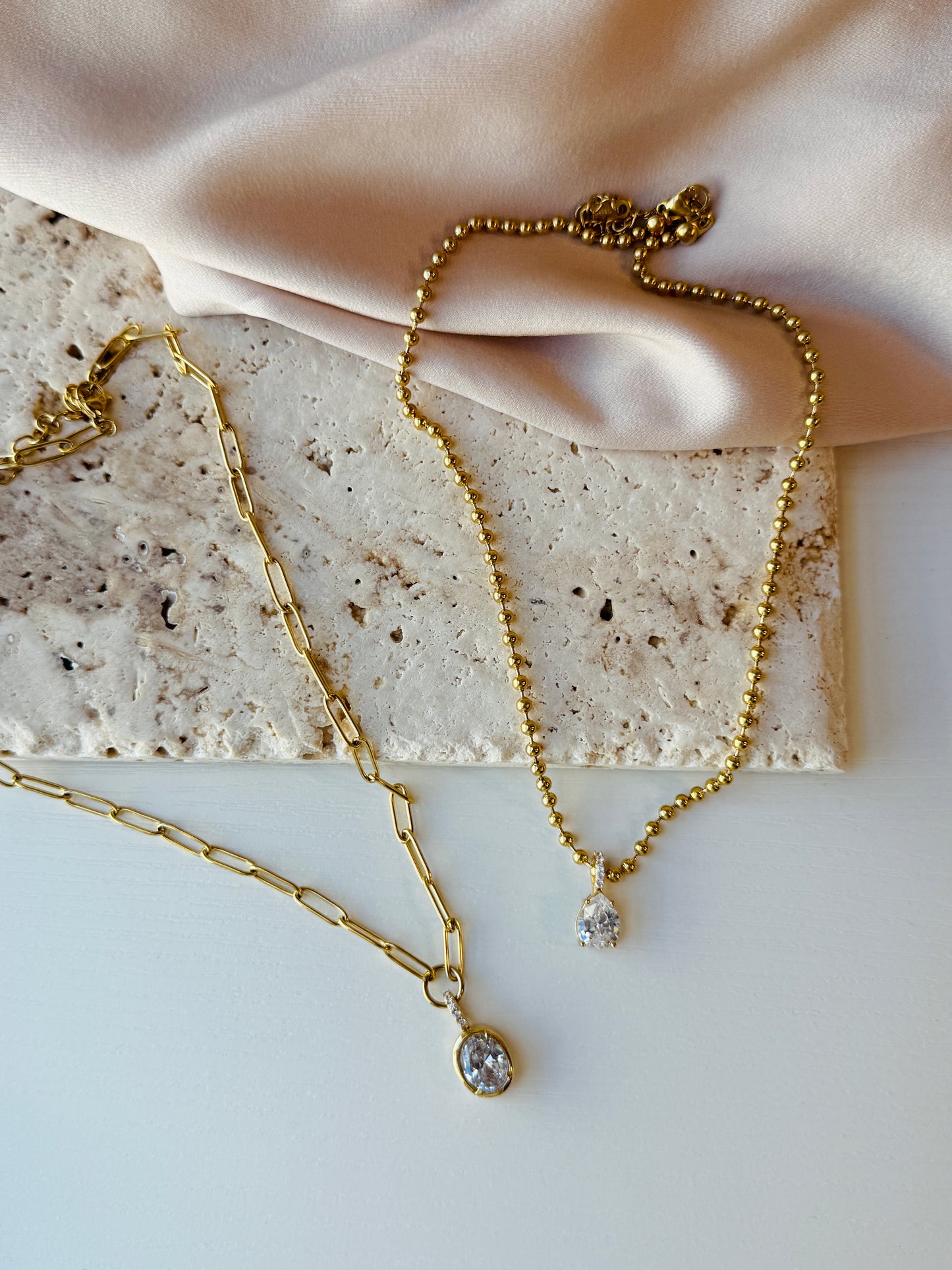 The Solis Duo necklaces